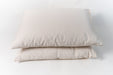 Natural kapok pillow. Covered in a sateen fabric of organic cotton fibers.