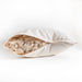 Natural kapok pillow. Covered in a sateen fabric of organic cotton fibers.