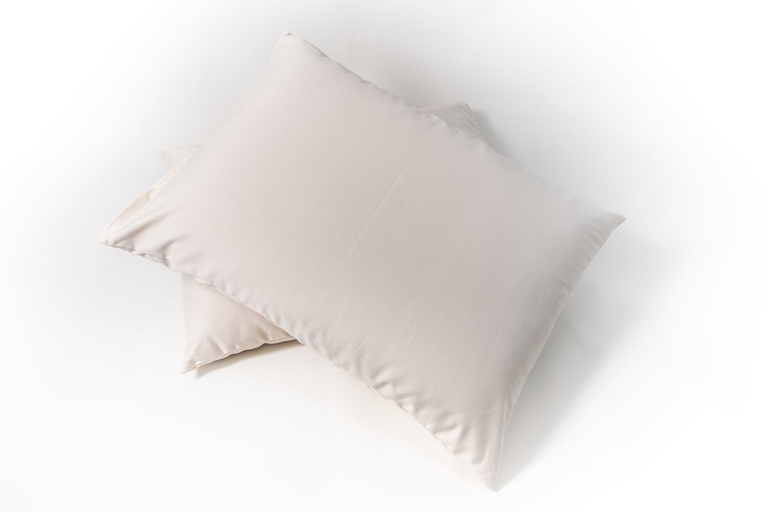 Natural Latex and wool pillow. Covered in a sateen fabric of organic cotton fibers.