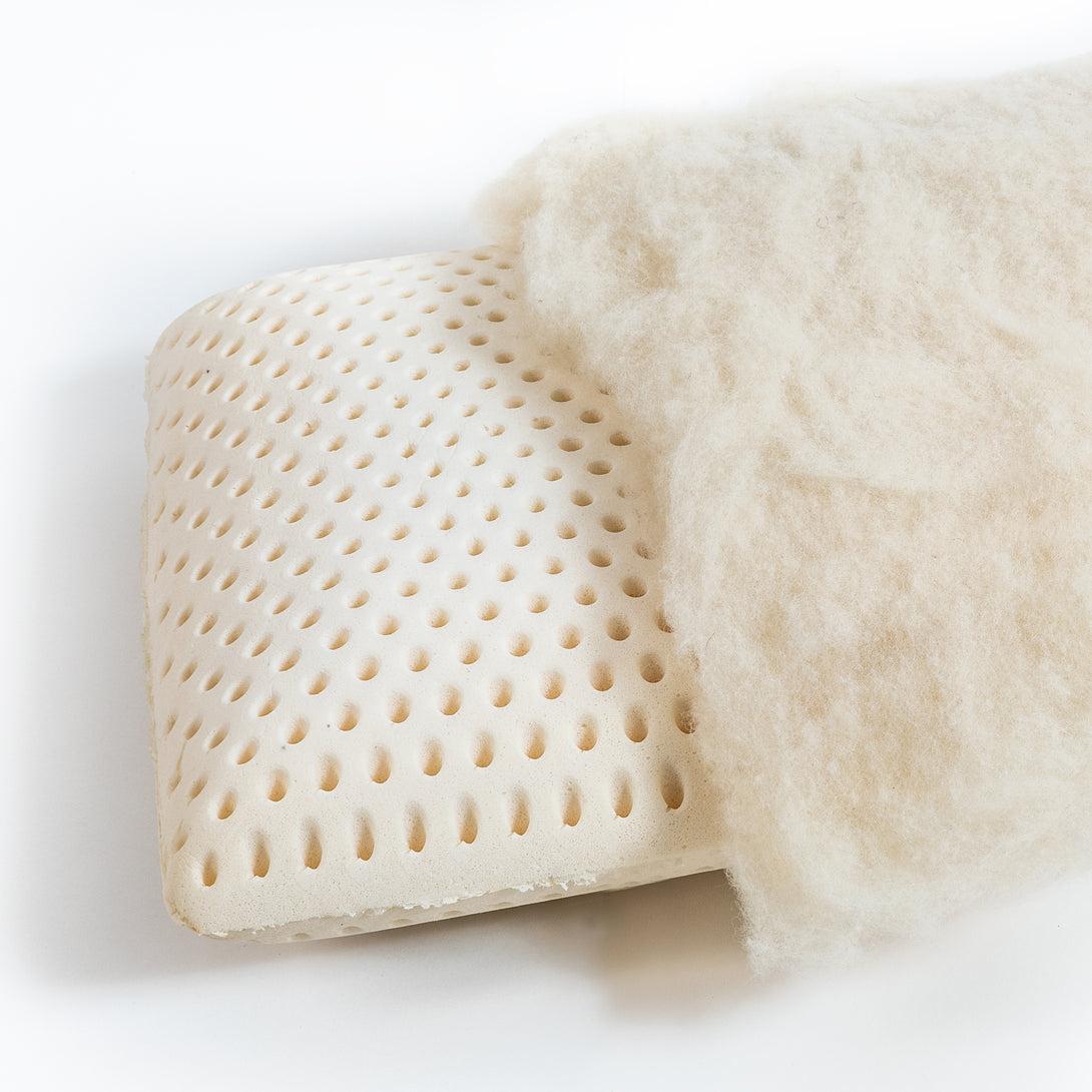 Natural Latex and wool pillow. Covered in a sateen fabric of organic cotton fibers.