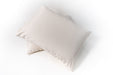 Natural Latex and wool pillow. Covered in a sateen fabric of organic cotton fibers.